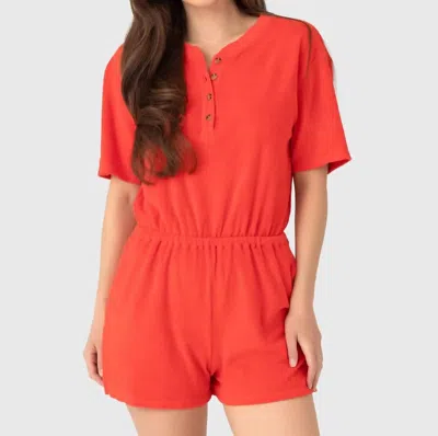 Xirena Evert Romper With Side Pockets In Fire Cracker In Red