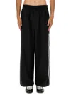 Y-3 Loose Black Jogger Pants With Adjustable Drawstring And Striped Details In Black