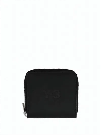 Y-3 BLACK COWHIDE COMPACT WALLET WITH ZIP-AROUND CLOSURE