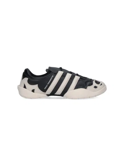 Y-3 Y-3 BLACK LEATHER SNEAKERS WITH CREAM ACCENTS AND ICONIC STRIPES