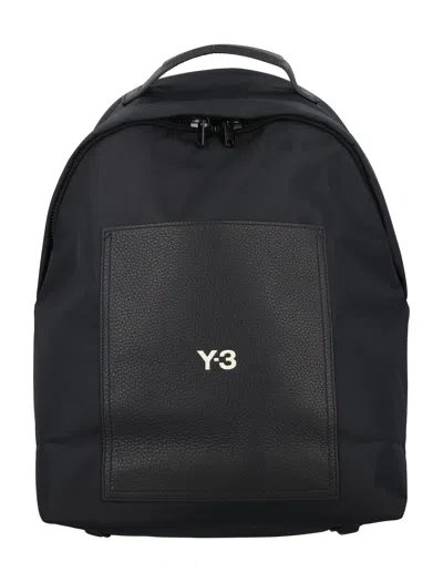 Y-3 Black Lux Backpack For Men Featuring Leather Top Handle, Zip Fastening, And Adjustable Shoulder Stra