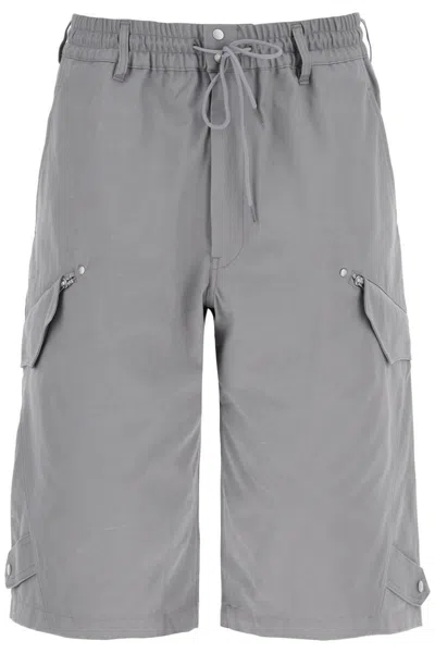 Y-3 CANVAS MULTI-POCKET BERMUDA SHORTS.