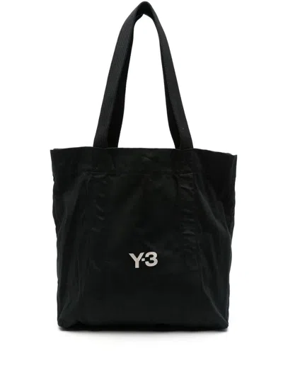 Y-3 Logo Printed Top Handle Bag In Black