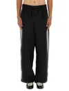 Y-3 Loose Black Jogger Pants With Adjustable Drawstring And Striped Details In Black