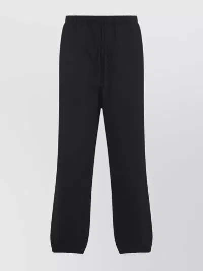 Y-3 TRACK PANTS WITH ELASTIC CUFFS AND POCKETS