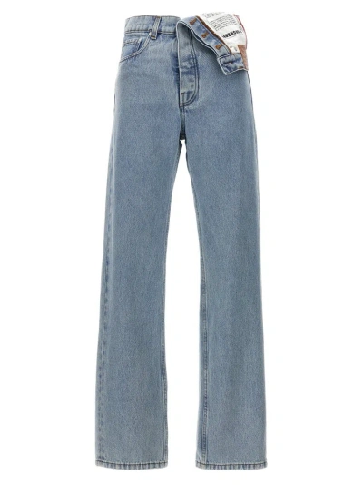 Y/project Logo Tag Asymmetric Jeans In Blue