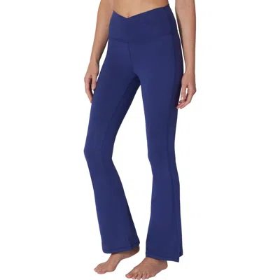 Yogalicious Crossover Flared Leggings In Blue