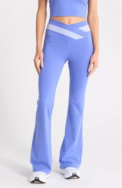 Yogalicious Lux Anya Crossover Colorblock Flared Leggings In Blue