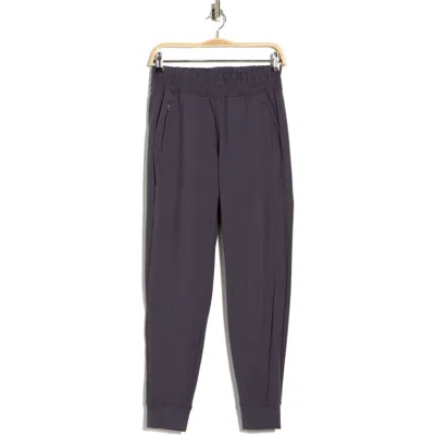 Yogalicious Lux District Zip Pocket Joggers In Black
