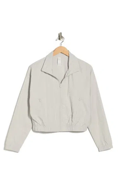 Yogalicious Radiant Zip Pocket Jacket In Gray