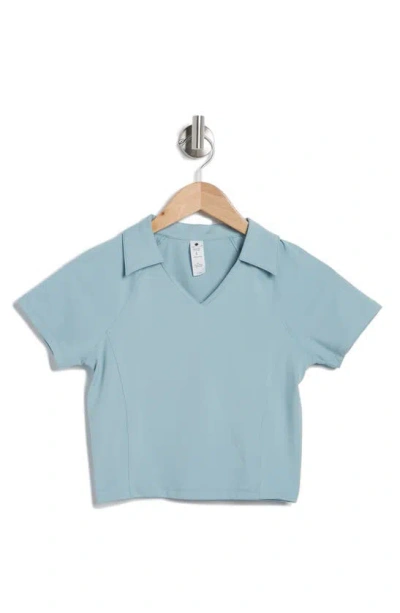 Yogalicious Seaport Johnny Collar Crop Polo In Tourmaline