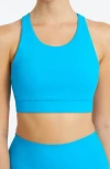 Yogaworks Crossback Performance Bra In Ocean
