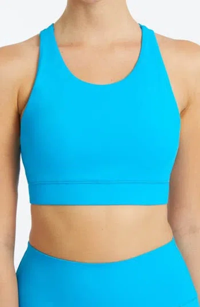 Yogaworks Crossback Performance Bra In Ocean