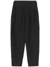 Yohji Yamamoto Crease-effect Tapered Trousers In Black