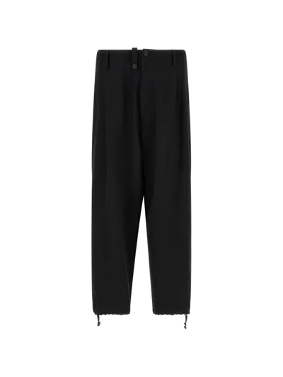 Yohji Yamamoto New Standard Wallet Asymmetric-closure Trousers In Black