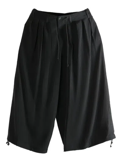 YOHJI YAMAMOTO PLEATED TROUSERS