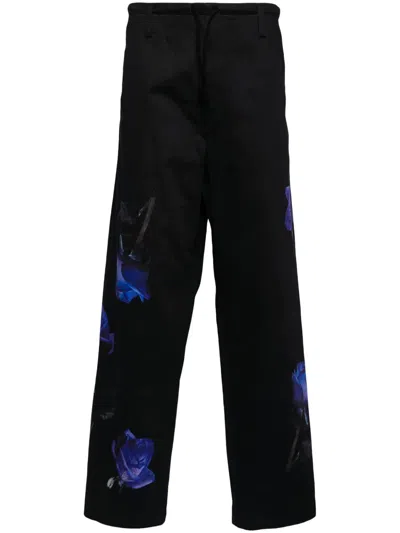 Yohji Yamamoto Rose-print Cotton Trousers In Black