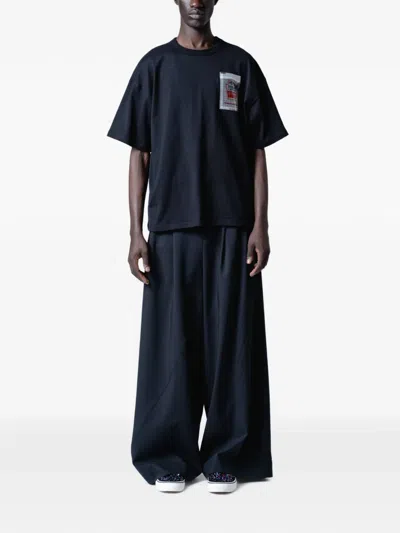 Yoshiokubo Twist Pleated Wide-leg Trousers In Black