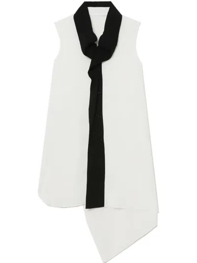 Y's Asymmetric Top In Weiss