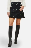 Yumi Flower Embroidered Cord Mini Skirt In Black