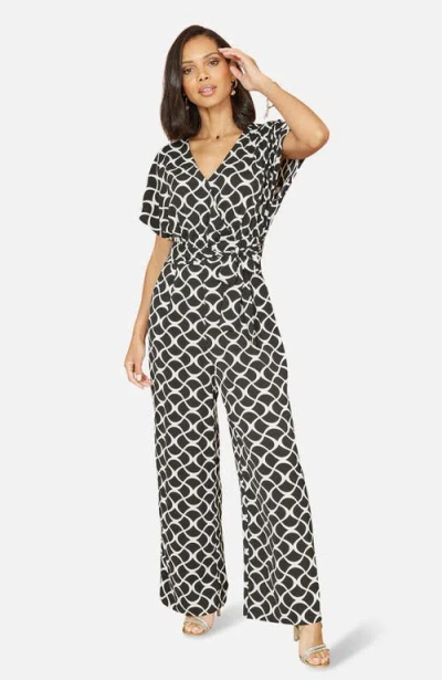 Yumi Geometric Print Wrap Jumpsuit In Black