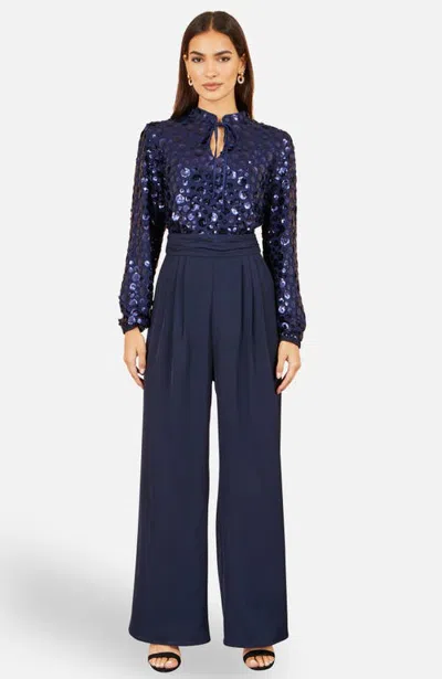 Yumi Long Sleeve Sequin Jumpsuit In Blue