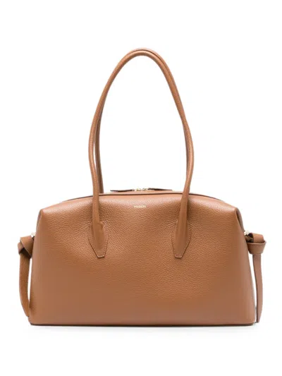 Yuzefi Brioche Duffle Grained-leather Shoulder Bag In Brown