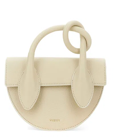 Yuzefi Pretzel Handbag In Beige