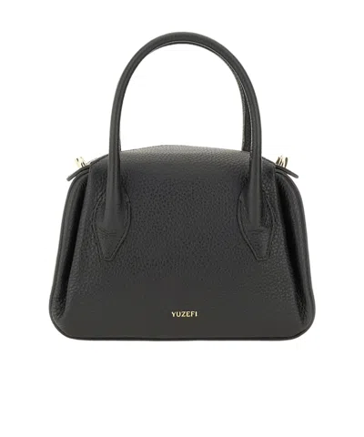 Yuzefi Zippered Shoulder Bag In Black