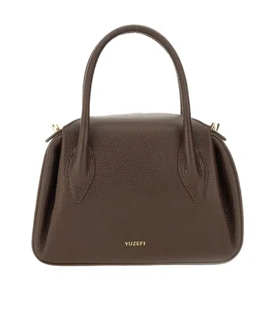 Yuzefi Zippered Shoulder Bag In Brown