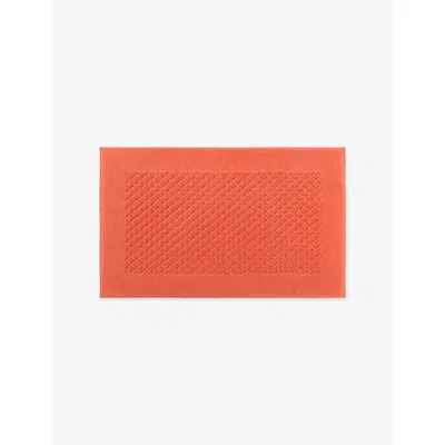 Yves Delorme Étoile Cotton Bath Mat Corallin In Orange
