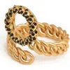Zarux Circle Twist Cuban Ring In Gold