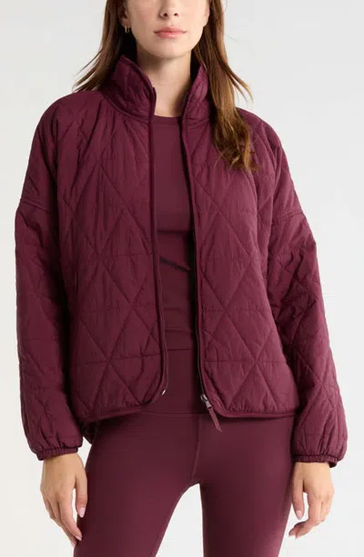 Zella Compass Quilted Packable Jacket In Burgundy