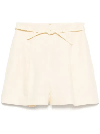 Zimmermann Illuminate Belted Pleated Linen Shorts In Yellow