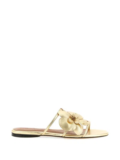 Zimmermann Laminated Leather Floral Slides In Gold