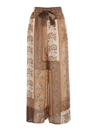 ZIMMERMANN 'LUCKY' BROWN PANTS WITH ELASTIC DRAWSTRING WAIST AND ALL-OVER FLORAL PRINT