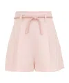 Zimmermann Illuminate Belted Pleated Linen Shorts In Pink