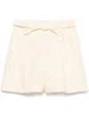 Zimmermann Illuminate Belted Pleated Linen Shorts In Yellow
