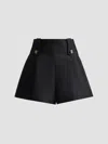 Zimmermann Valiant Tailored Button-embellished Pleated Shorts In Black