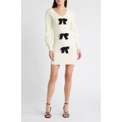 Zoe And Claire Bow Long Sleeve Sweater Dress In Cream