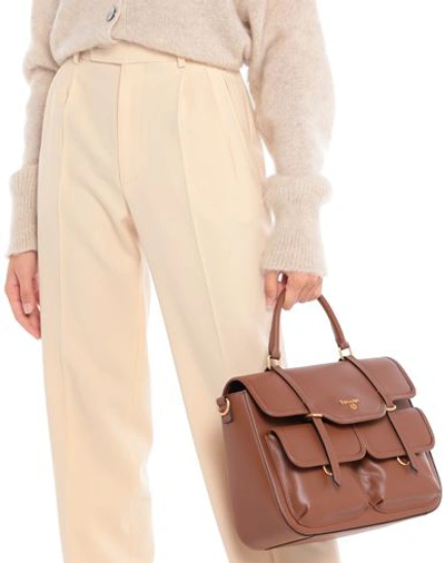 Shop Pollini Handbags In Brown