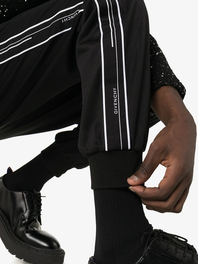 Shop Givenchy Logo Trousers In Black