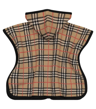 Shop Burberry Baby Checked Merino Wool Poncho In Beige