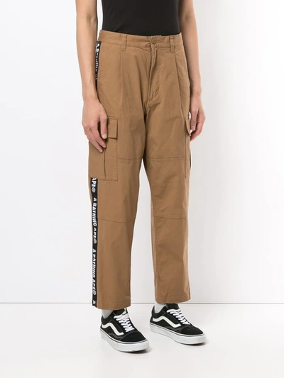 Shop A Bathing Ape Logo-tape Cargo Trousers In Brown