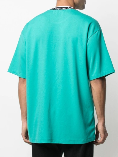 Shop Acne Studios Logo-trim Oversized T-shirt In Green