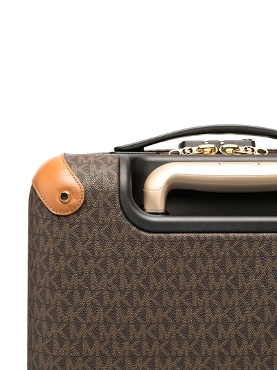 Shop Michael Kors Monogram Logo Print Suitcase In Brown