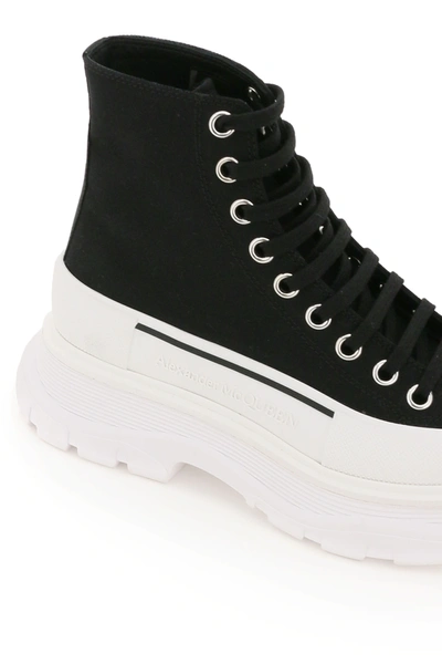 Shop Alexander Mcqueen Tread Sleek Boots In Black,white