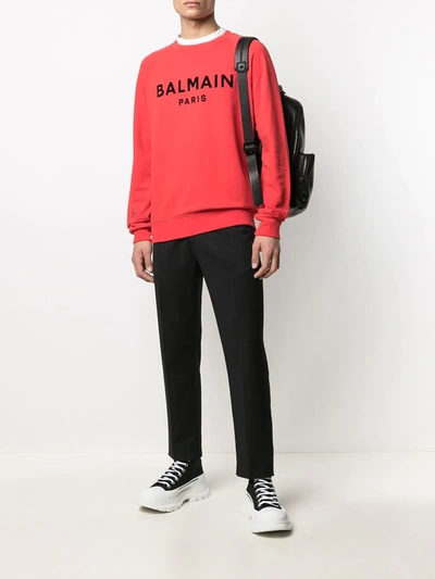 Shop Balmain Flocked Logo Sweatshirt In Red
