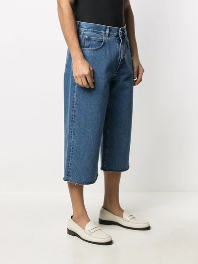 Shop Versace Wide-leg Cropped Jeans In Blue