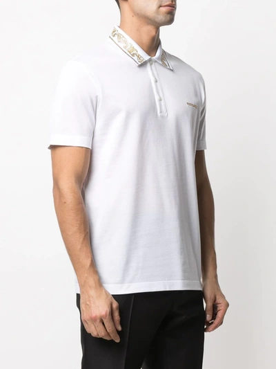 Shop Versace Rhinestone-embellished Logo Polo Shirt In White